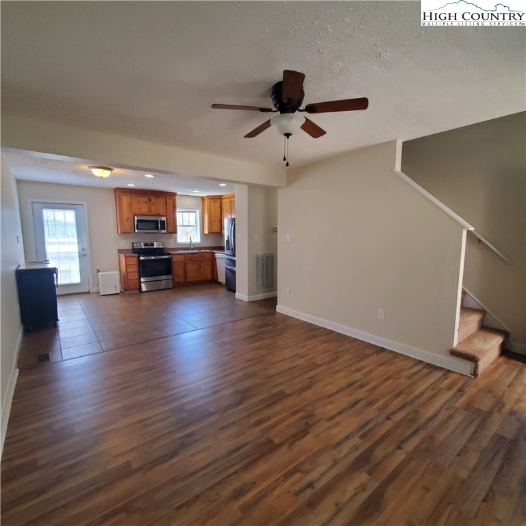 161 Alexander Drive Boone, NC 28607 - Photo 5 of 28 a view of a livingroom with furniture wooden floor and window