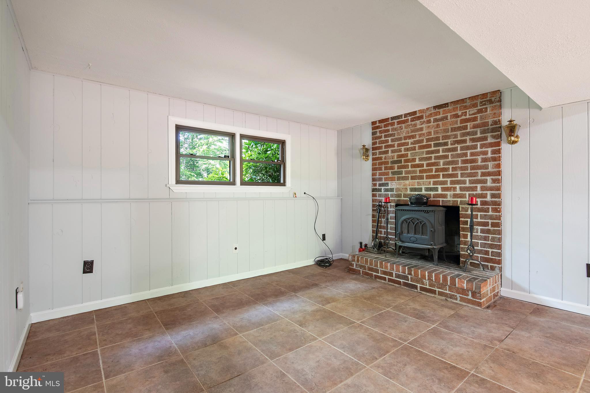 1701 Underwood Road Gambrills, MD 21054 - Photo 48 of 62 Rec Room with fireplace / wood stove