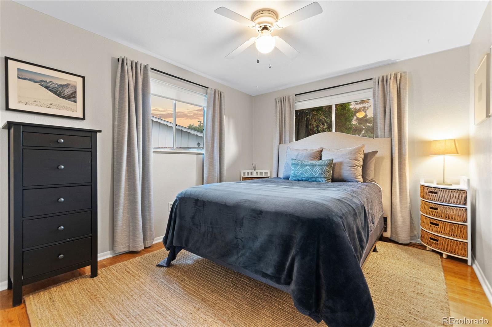 5366 Field Circle Arvada, CO 80002 - Photo 25 of 50 a bedroom with a bed and a dresser
