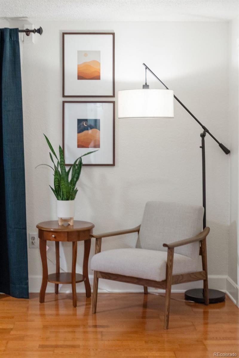 5366 Field Circle Arvada, CO 80002 - Photo 33 of 50 a living room with furniture and a potted plant