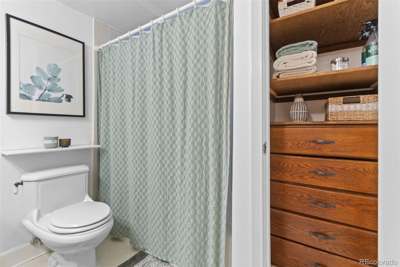 5366 Field Circle Arvada, CO 80002 - Photo 36 of 50 a bathroom with a toilet and a sink