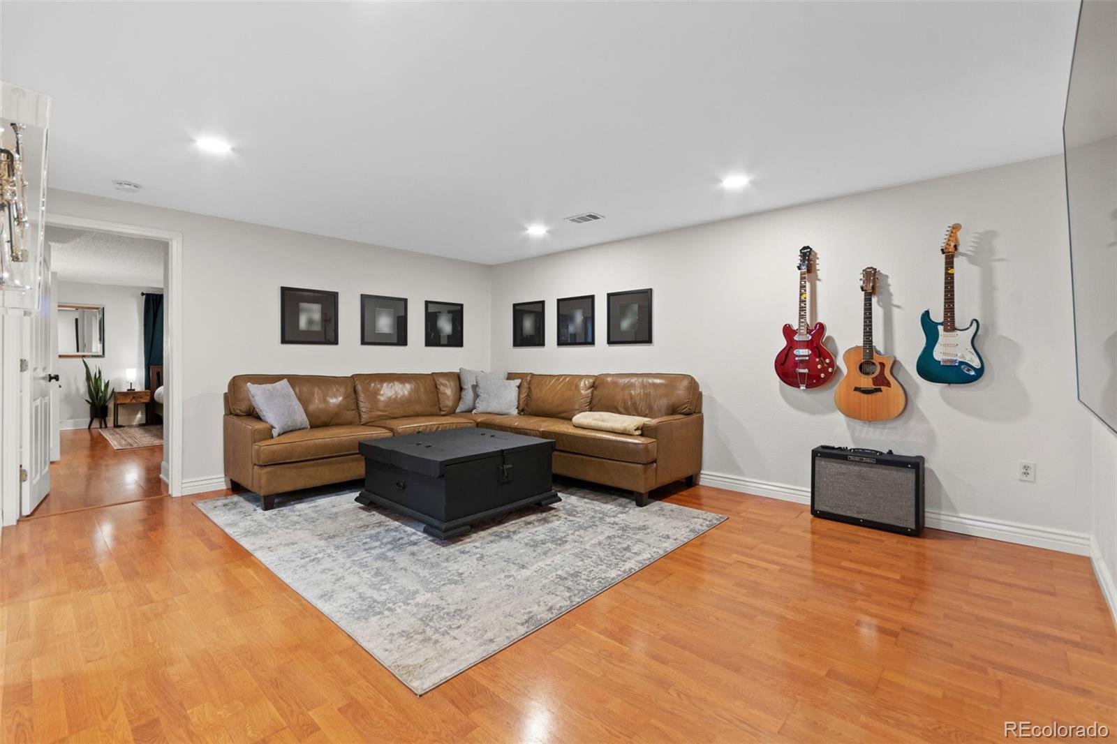 5366 Field Circle Arvada, CO 80002 - Photo 38 of 50 a living room with furniture and kitchen view