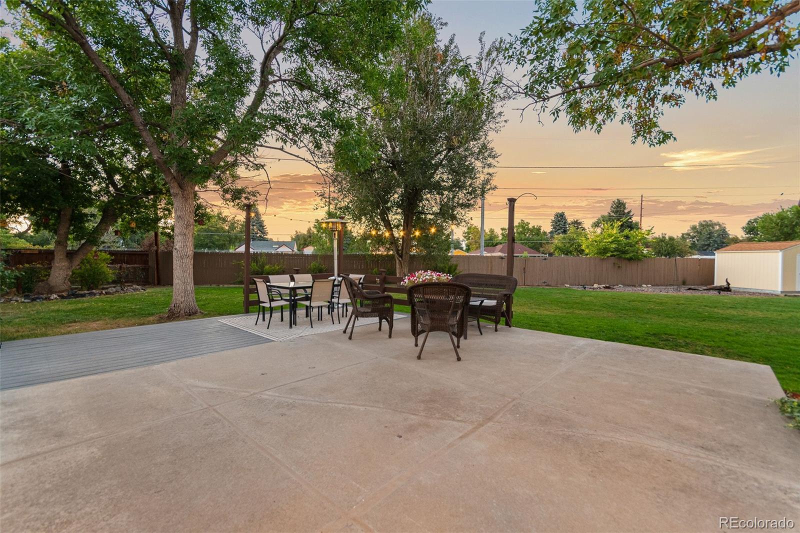 5366 Field Circle Arvada, CO 80002 - Photo 41 of 50 a view of backyard with seating area and green space
