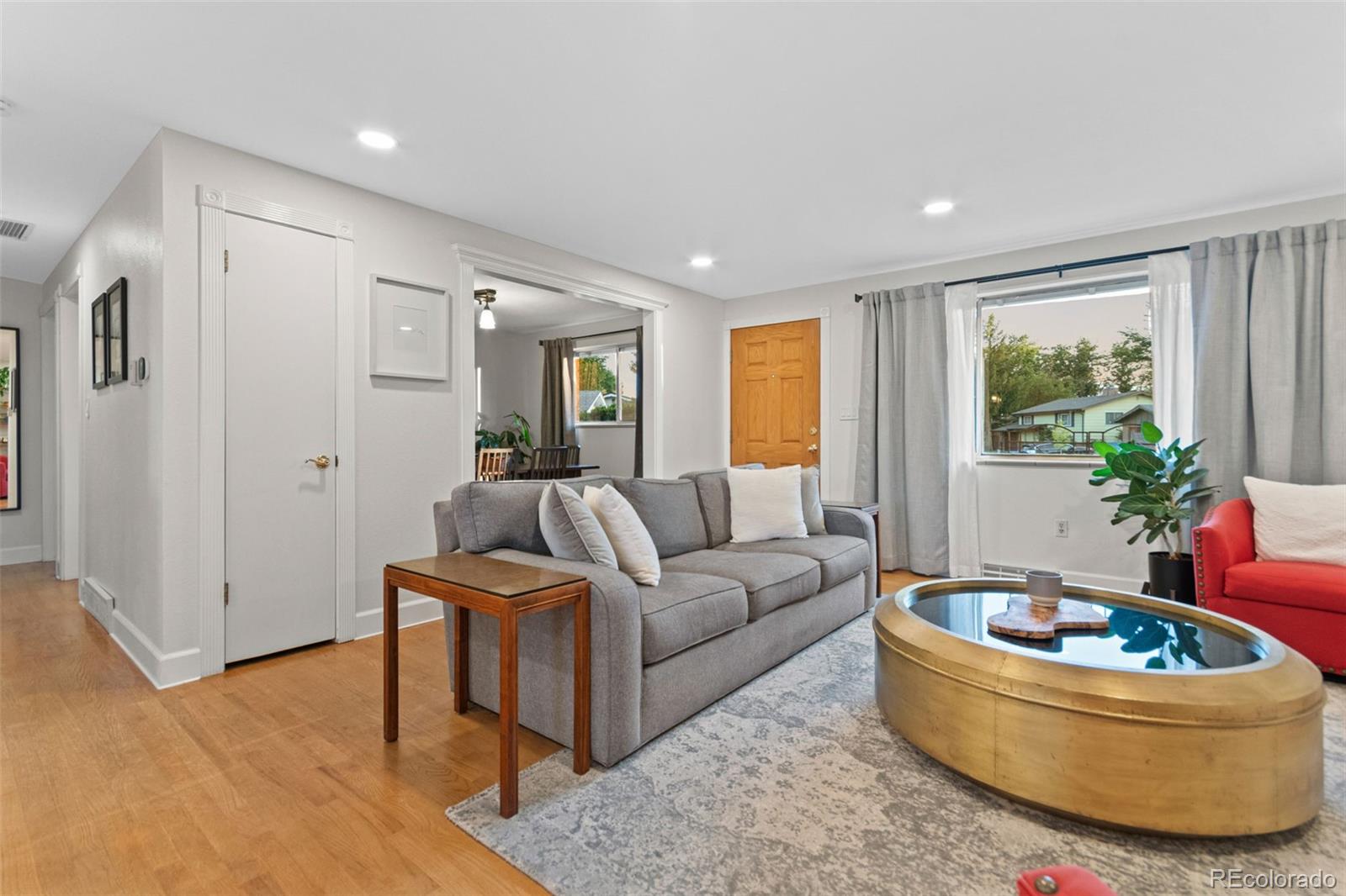 5366 Field Circle Arvada, CO 80002 - Photo 8 of 50 a living room with furniture and a window