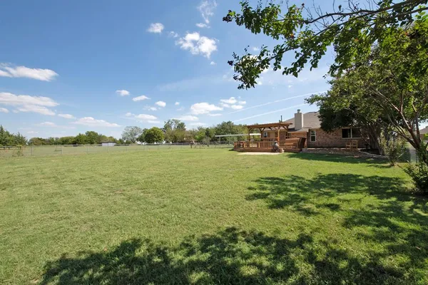 a view of a lake with a big yard