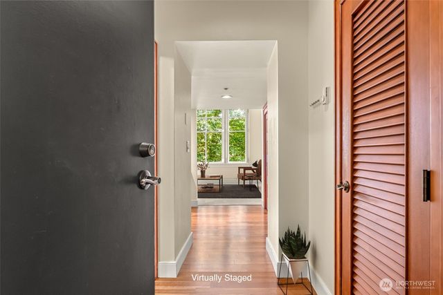 a view of a hallway with a outdoor space