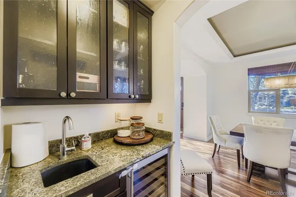 a kitchen with sink and a table