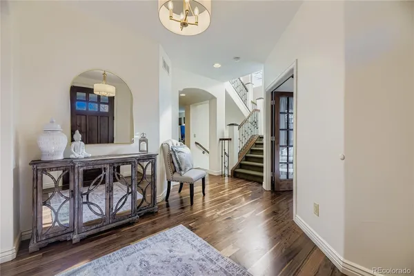 a view of living room and wooden floor