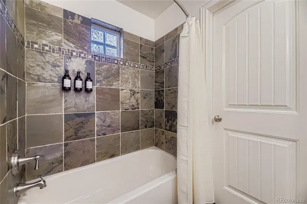 a bathroom with a bathtub