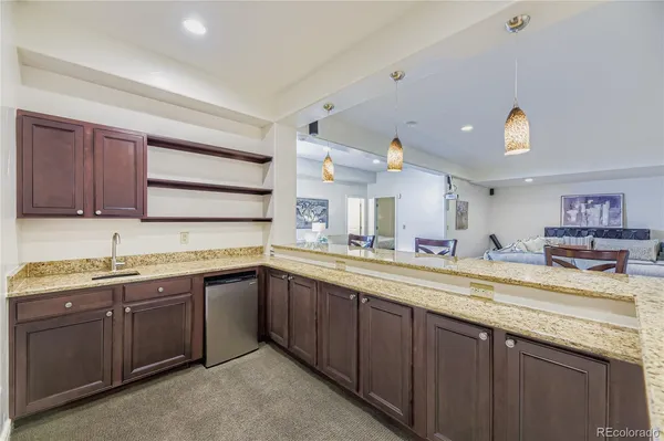a kitchen with lots of counter space and a sink