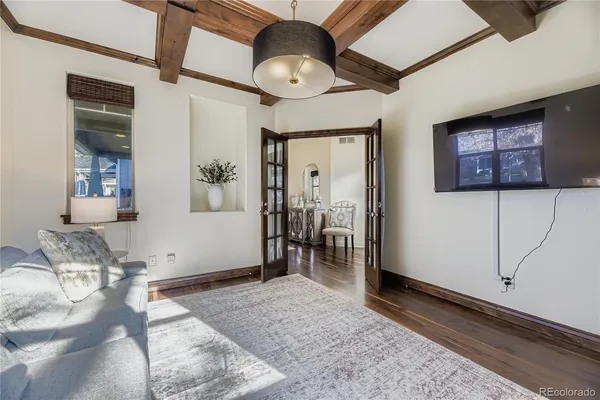 a bedroom with furniture and window