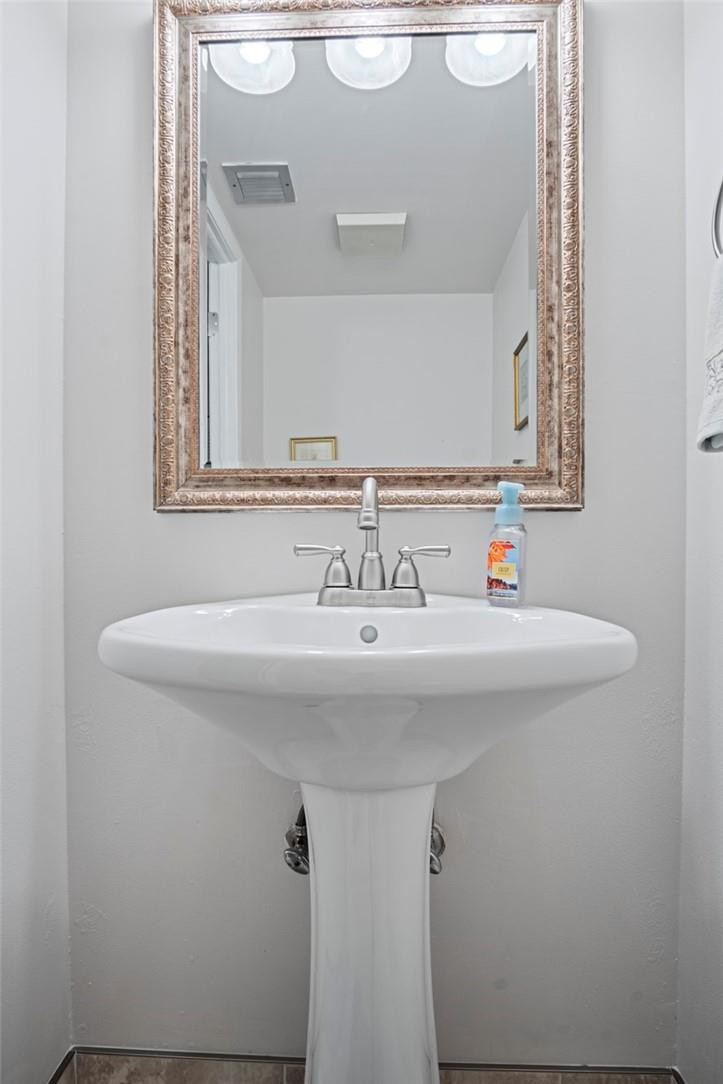 2810 North 46th Avenue, Unit 462 Hollywood, FL 33021 - Photo 14 of 31 a sink with a mirror