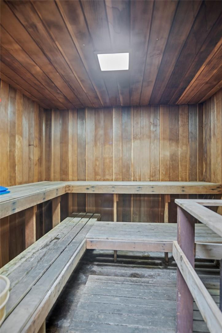 2810 North 46th Avenue, Unit 462 Hollywood, FL 33021 - Photo 25 of 31 a view of kitchen with stainless steel appliances wooden cabinets and a stove top oven