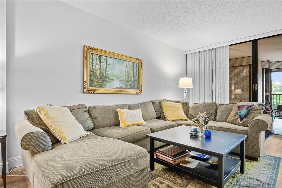 2810 North 46th Avenue, Unit 462 Hollywood, FL 33021 - Photo 7 of 31 a living room with furniture and a large window