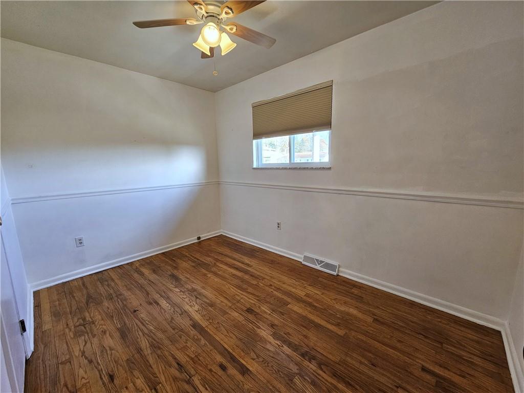 263 Lacock Street Washington, PA 15301 - Photo 13 of 33 wooden floor in an empty room with a window