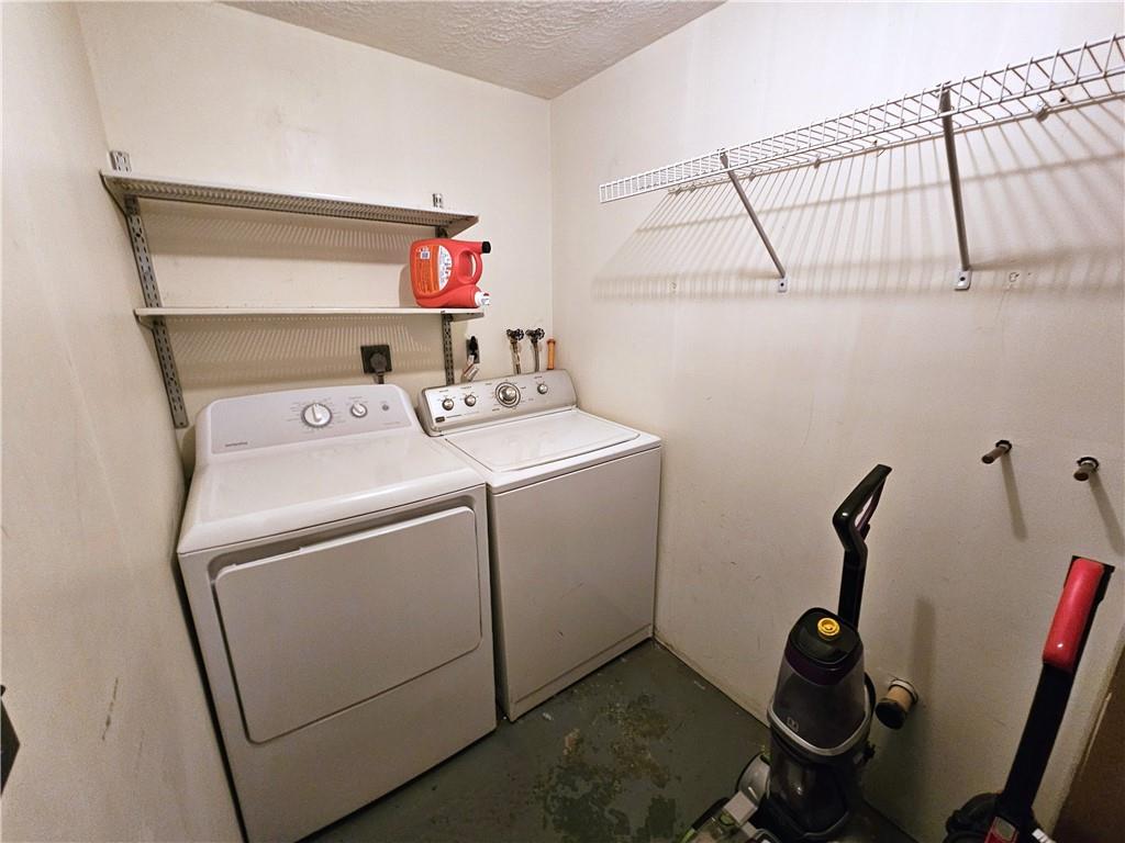 263 Lacock Street Washington, PA 15301 - Photo 22 of 33 a utility room with dryer and washer