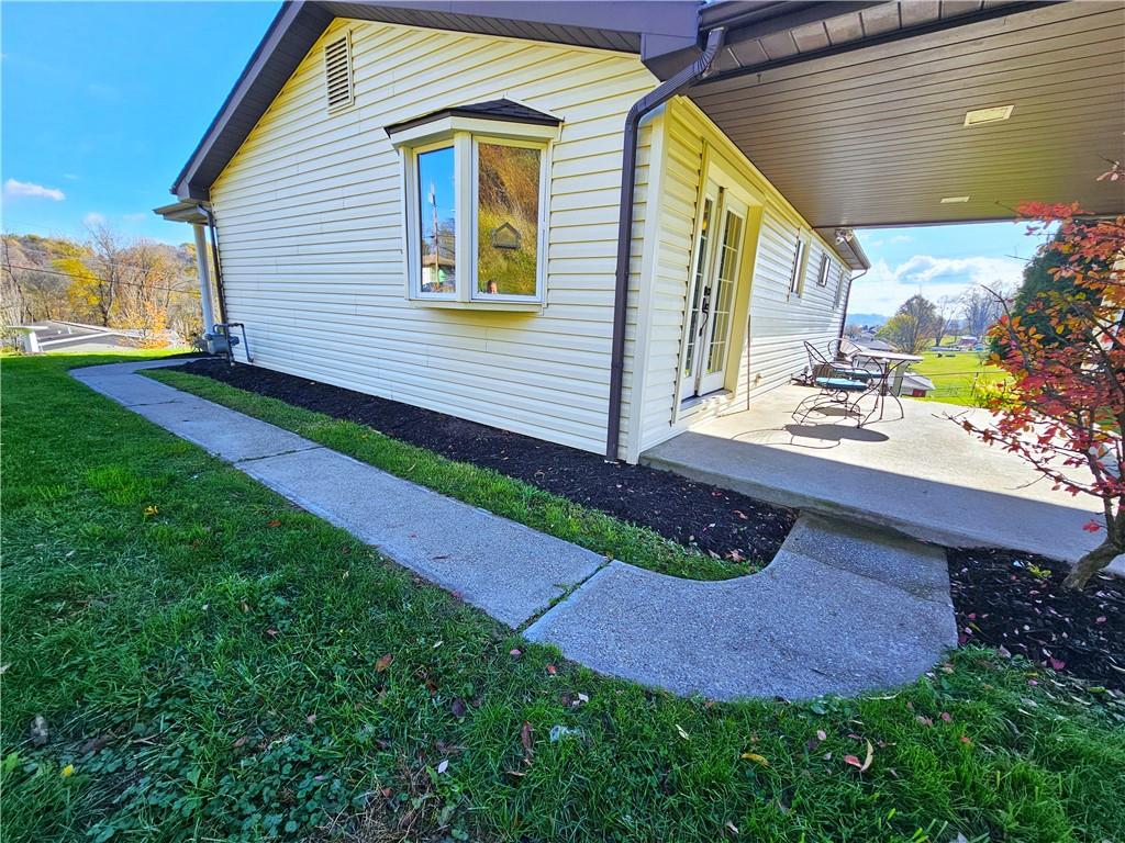 263 Lacock Street Washington, PA 15301 - Photo 29 of 33 a front view of a house with garden