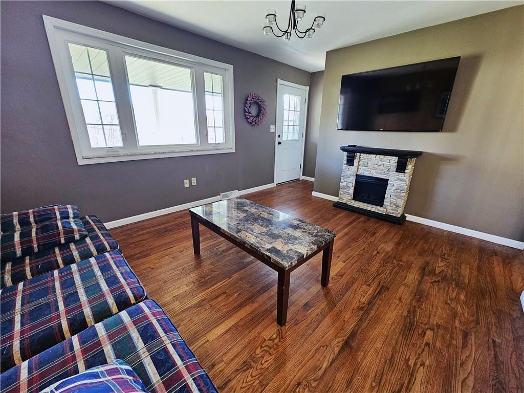 263 Lacock Street Washington, PA 15301 - Photo 3 of 33 a living room with furniture and a flat screen tv