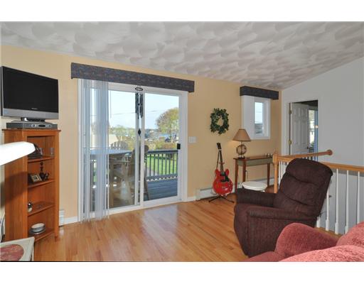 5 White Cap Road Narragansett, RI 02882 - Photo 3 of 20 Living Room. lovely hardwood floor, slider to large deck with ocean views