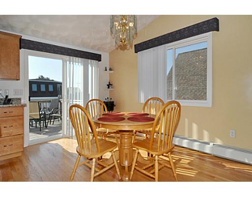 5 White Cap Road Narragansett, RI 02882 - Photo 5 of 20 Dining Area. light and bright and open to kitchen and living room. Slider to rear deck with Eastern exposure and stairs down to patio