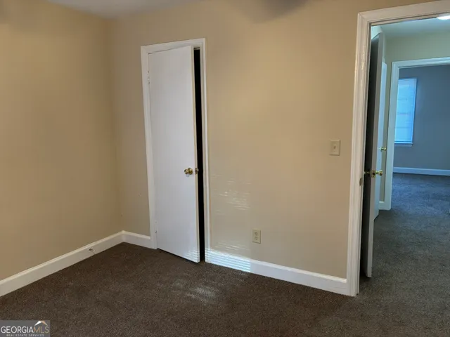 an empty room with closet