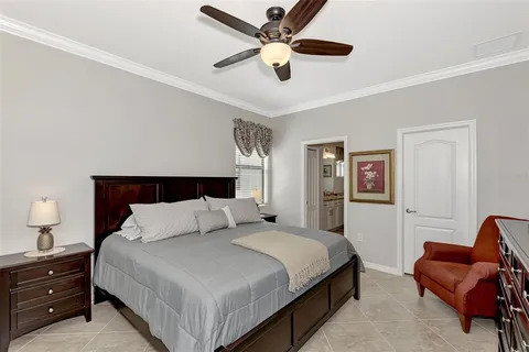 a bedroom with a bed and furniture