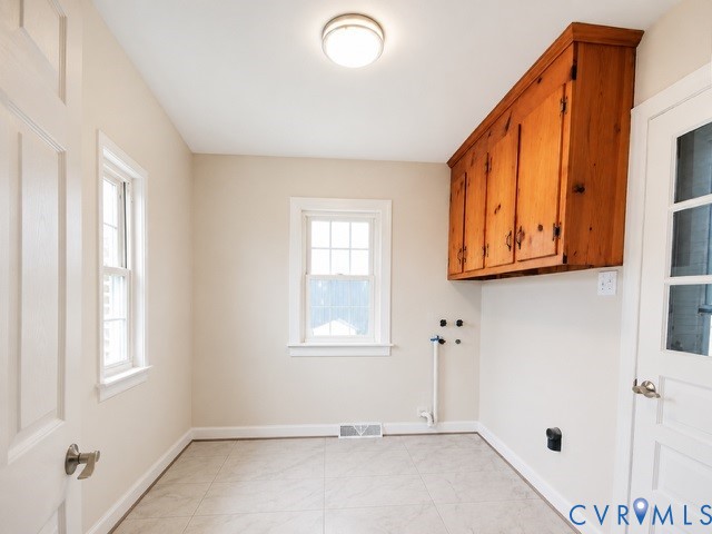 16487 Mountain Road Montpelier, VA 23192 - Photo 7 of 16 a view of an entryway with wooden floor and windows