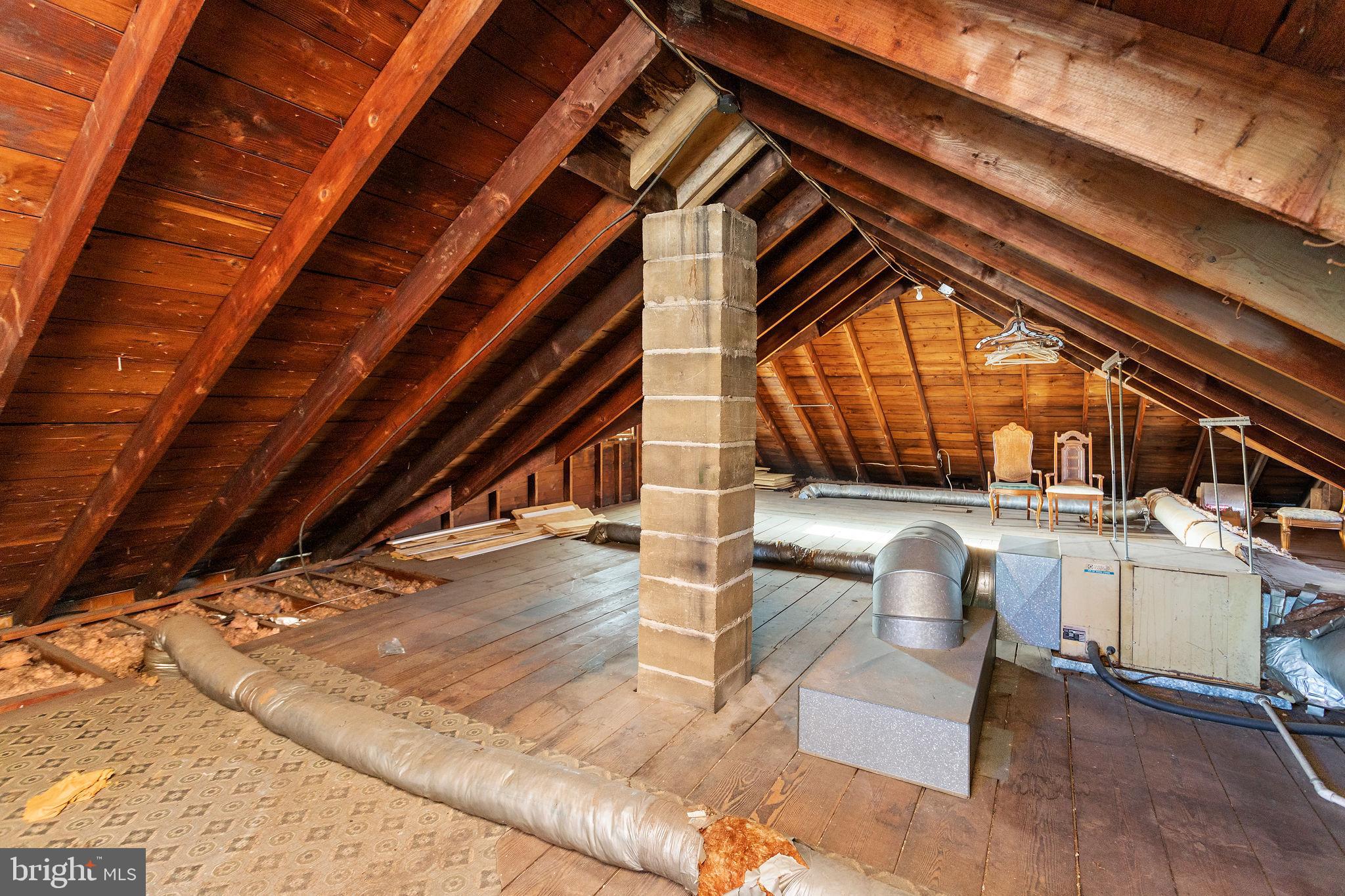 140 Maddock Avenue Hamilton, NJ 08610 - Photo 21 of 29 a view of patio with a table and chairs and couches under an umbrella