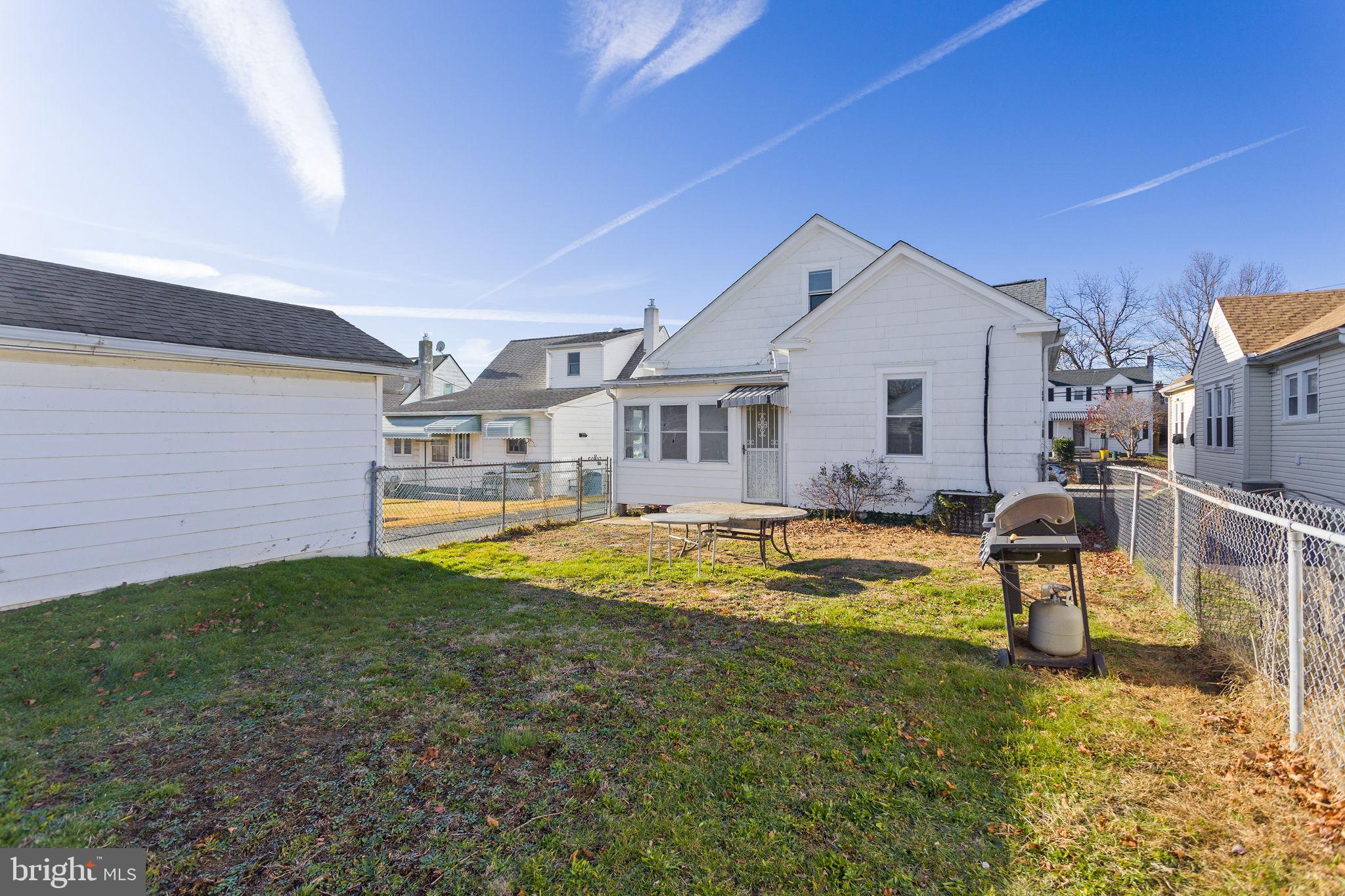 140 Maddock Avenue Hamilton, NJ 08610 - Photo 26 of 29 a view of a house with pool and a yard
