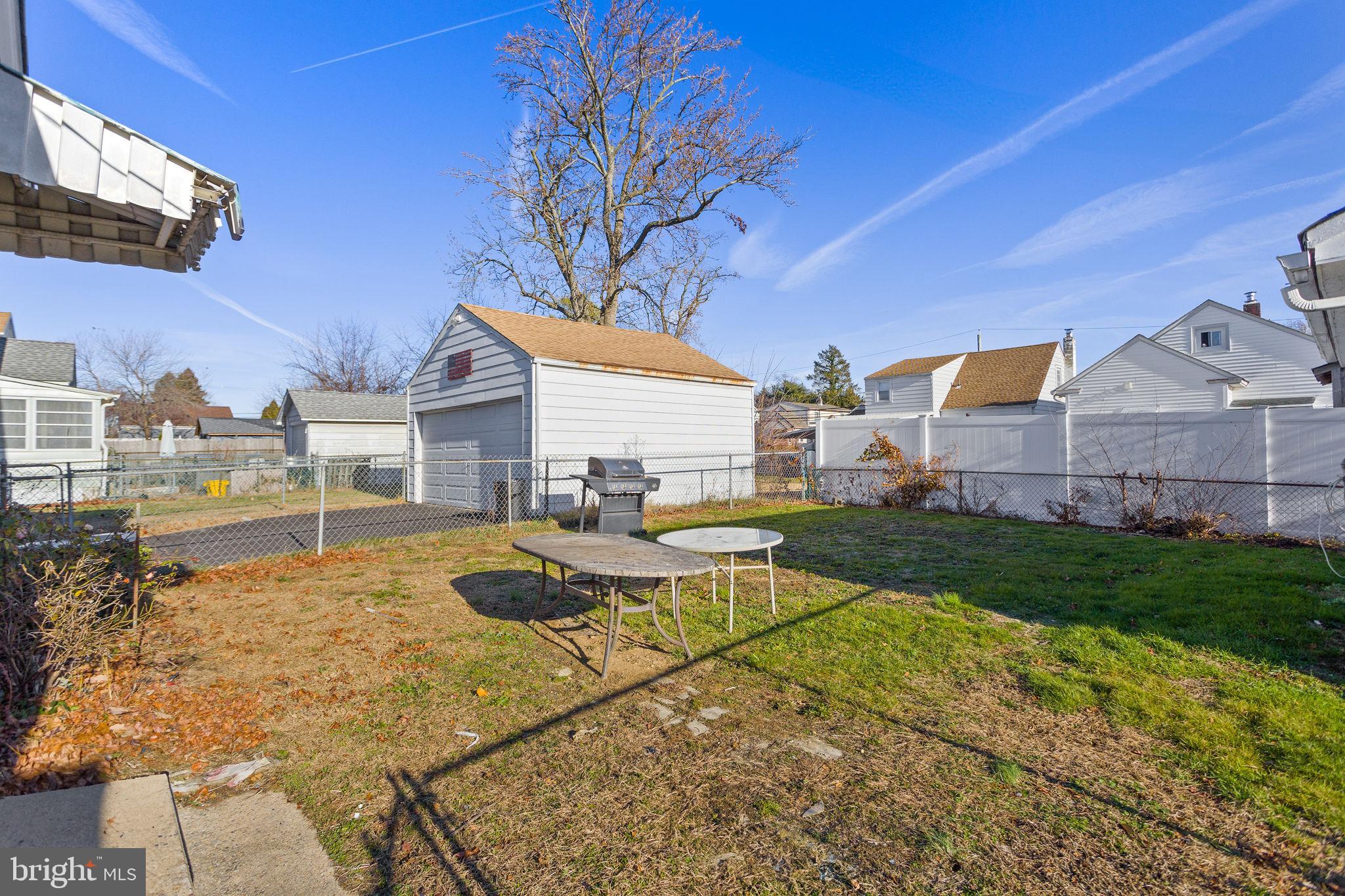 140 Maddock Avenue Hamilton, NJ 08610 - Photo 28 of 29 a view of a house with backyard and sitting area