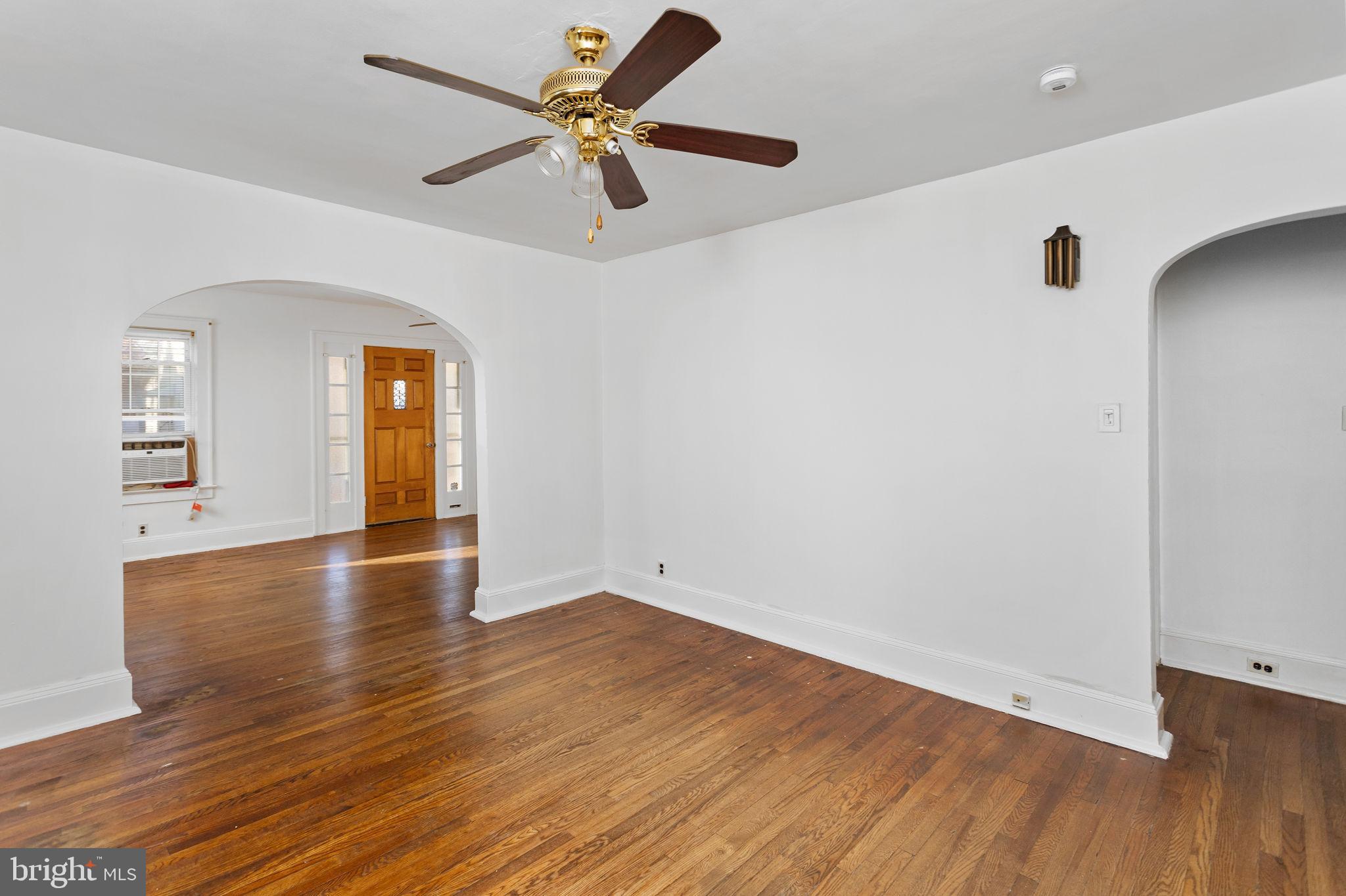 140 Maddock Avenue Hamilton, NJ 08610 - Photo 10 of 29 wooden floor in an empty room with a window