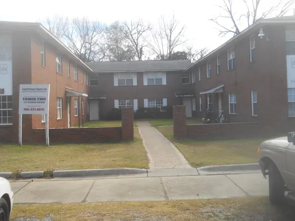 a view of a building with a swimming pool