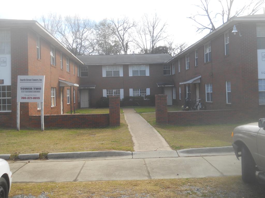 512 2nd Avenue, Unit 7 Columbus, GA 31901 - Photo 1 of 3 a view of a building with a swimming pool