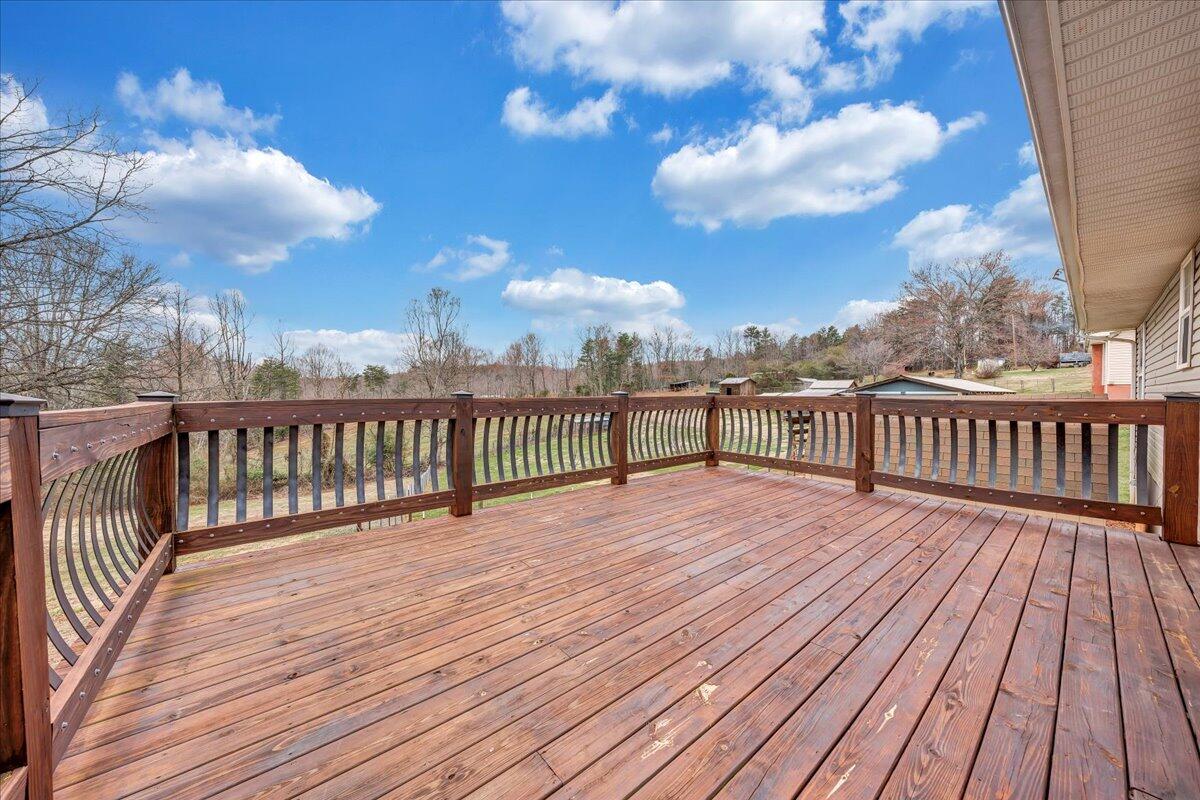 2152 Egg Farm Road Patrick Springs, VA 24133 - Photo 21 of 32 a view of wooden deck and a patio