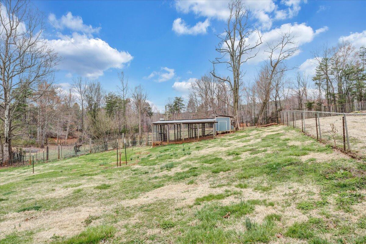 2152 Egg Farm Road Patrick Springs, VA 24133 - Photo 29 of 32 a view of a house with a backyard