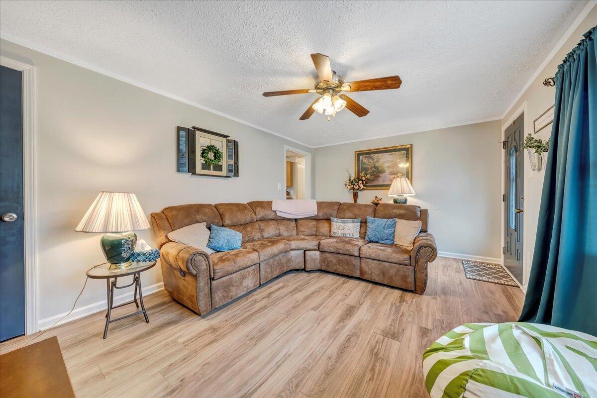 2152 Egg Farm Road Patrick Springs, VA 24133 - Photo 5 of 32 a living room with furniture and a wooden floor