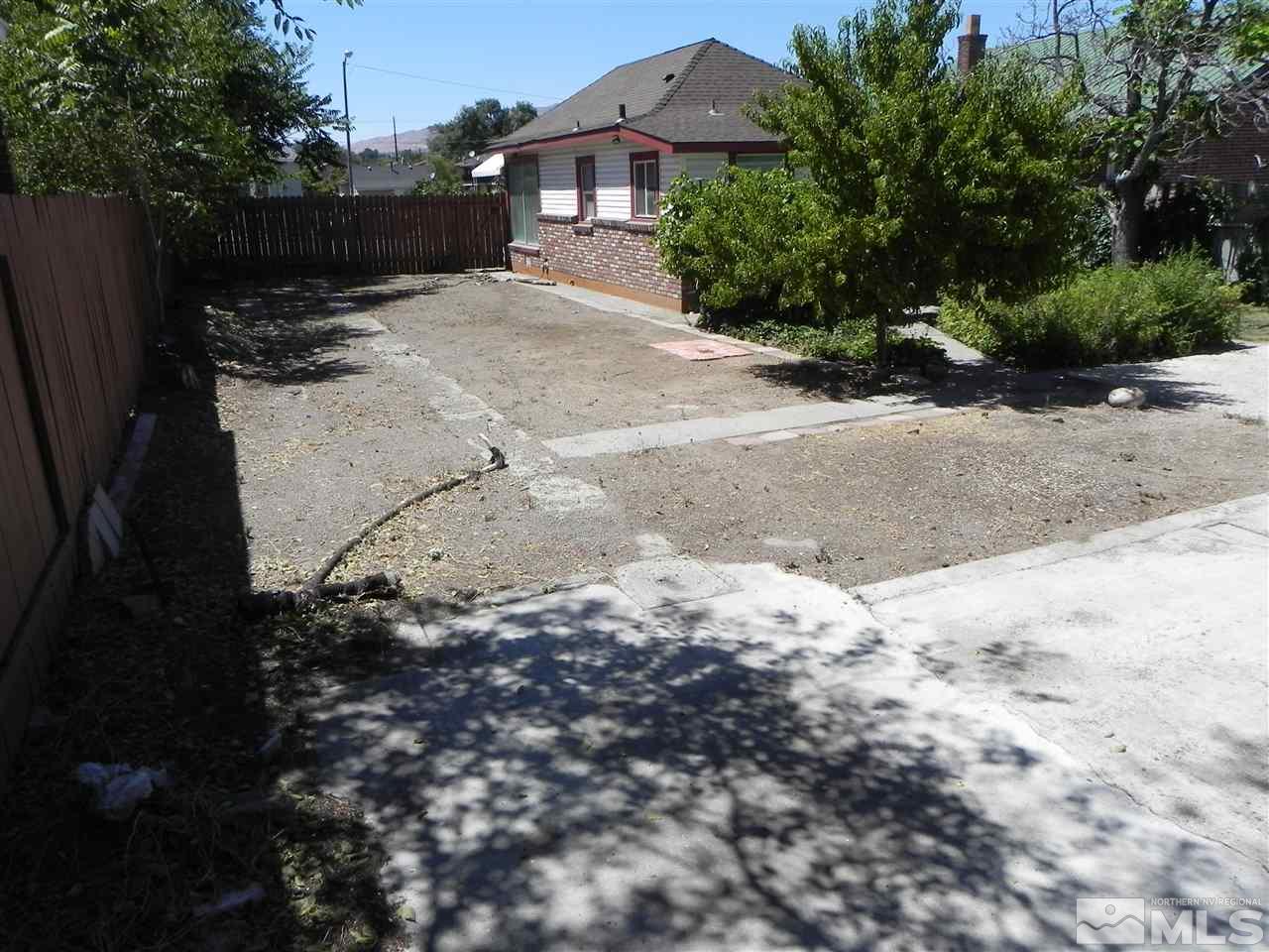 624 Quincy Street Reno, NV 89512 - Photo 16 of 17 a view of a house with a yard