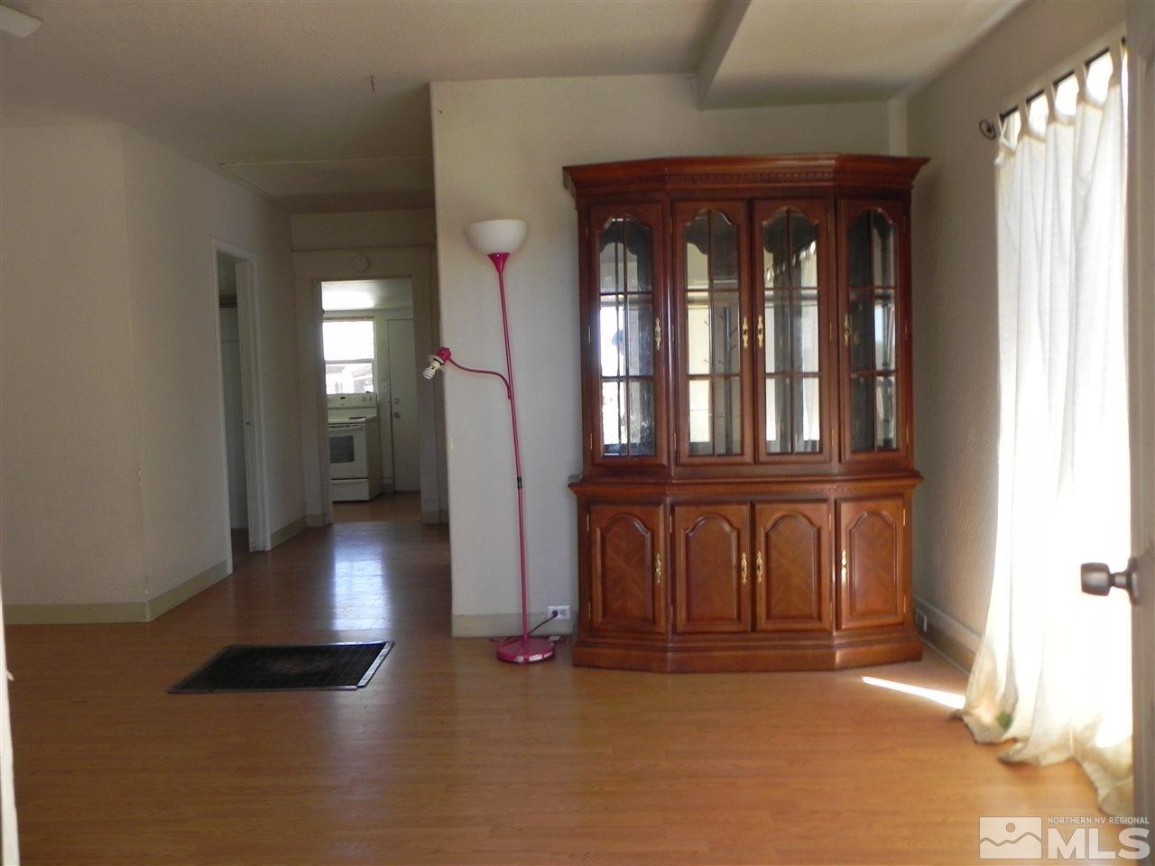 624 Quincy Street Reno, NV 89512 - Photo 3 of 17 a view of a entryway door with a couch