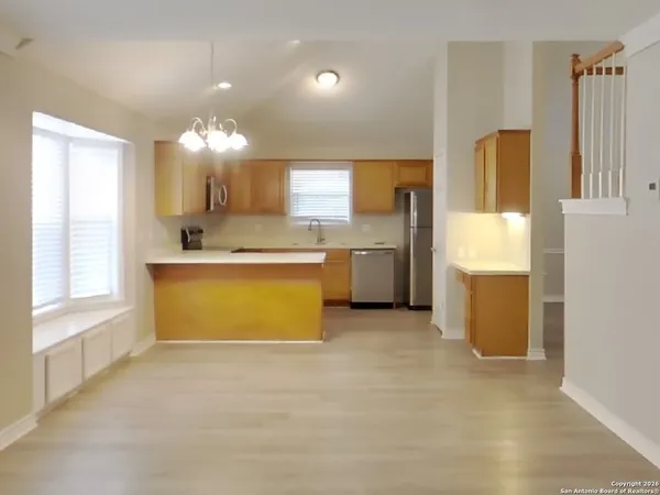 a view of a kitchen with a sink cabinets and a kitchen