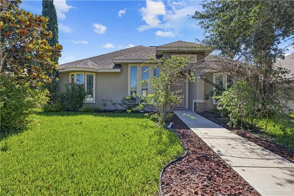 a view of a house with garden