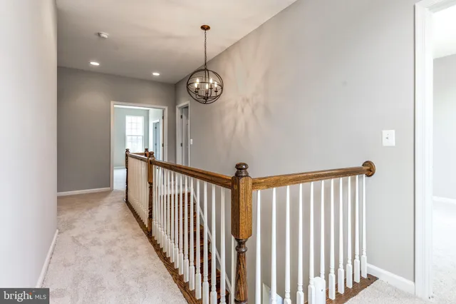 a view of a hallway with a window