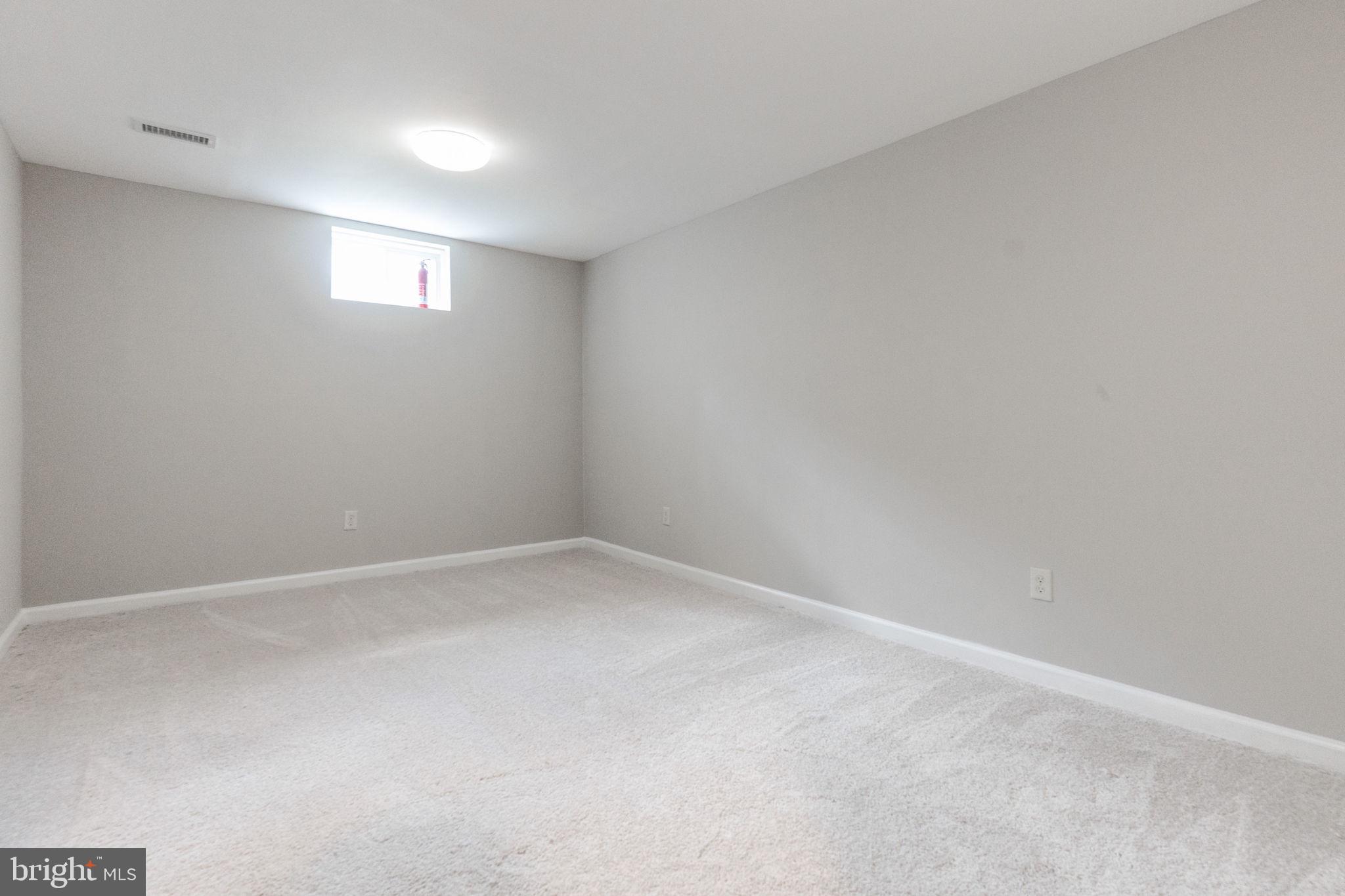 12021 Spring Beauty Road Bristow, VA 20136 - Photo 30 of 43 wooden floor in an empty room