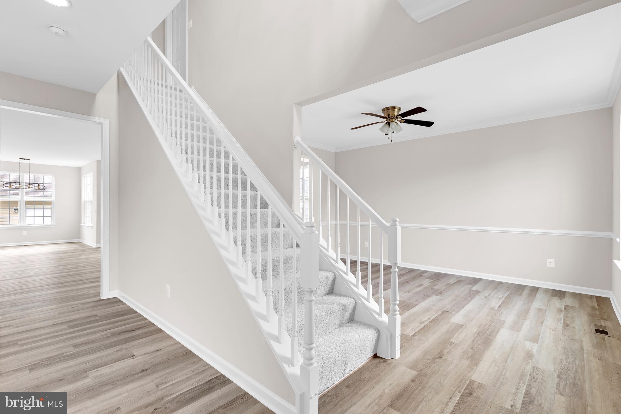 12021 Spring Beauty Road Bristow, VA 20136 - Photo 43 of 43 a view of entryway and hall with wooden floor