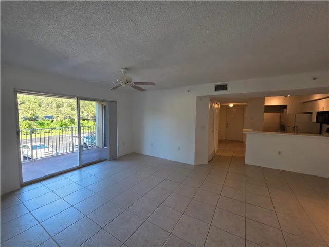 a view of a livingroom with a furniture and a window