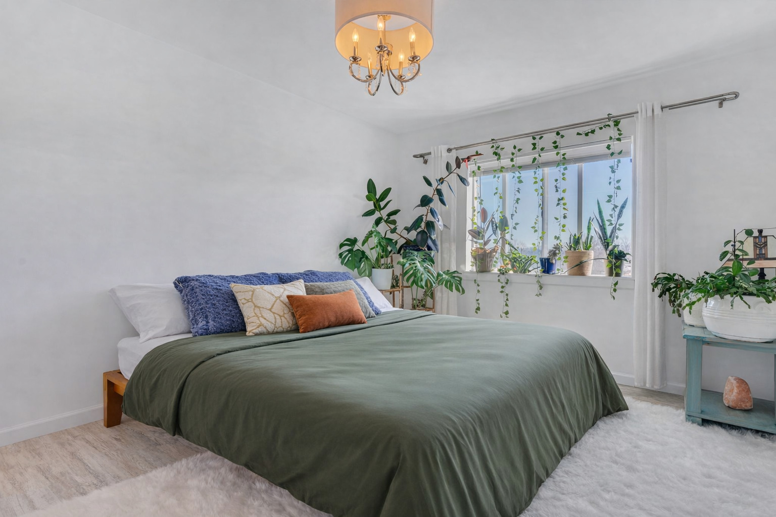 9820 South Pulaski Road, Unit 315 Oak Lawn, IL 60453 - Photo 11 of 20 a bedroom with a bed and a potted plant