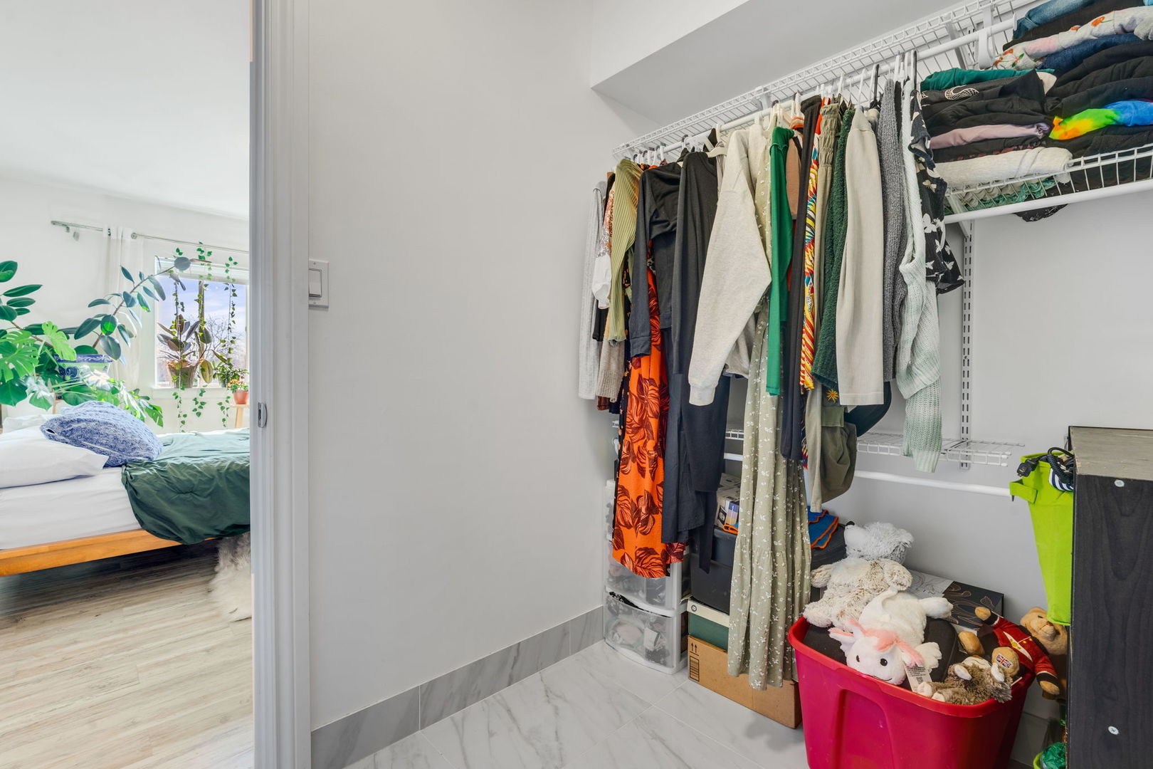 9820 South Pulaski Road, Unit 315 Oak Lawn, IL 60453 - Photo 12 of 20 a view of walk in closet with clothes and shoes