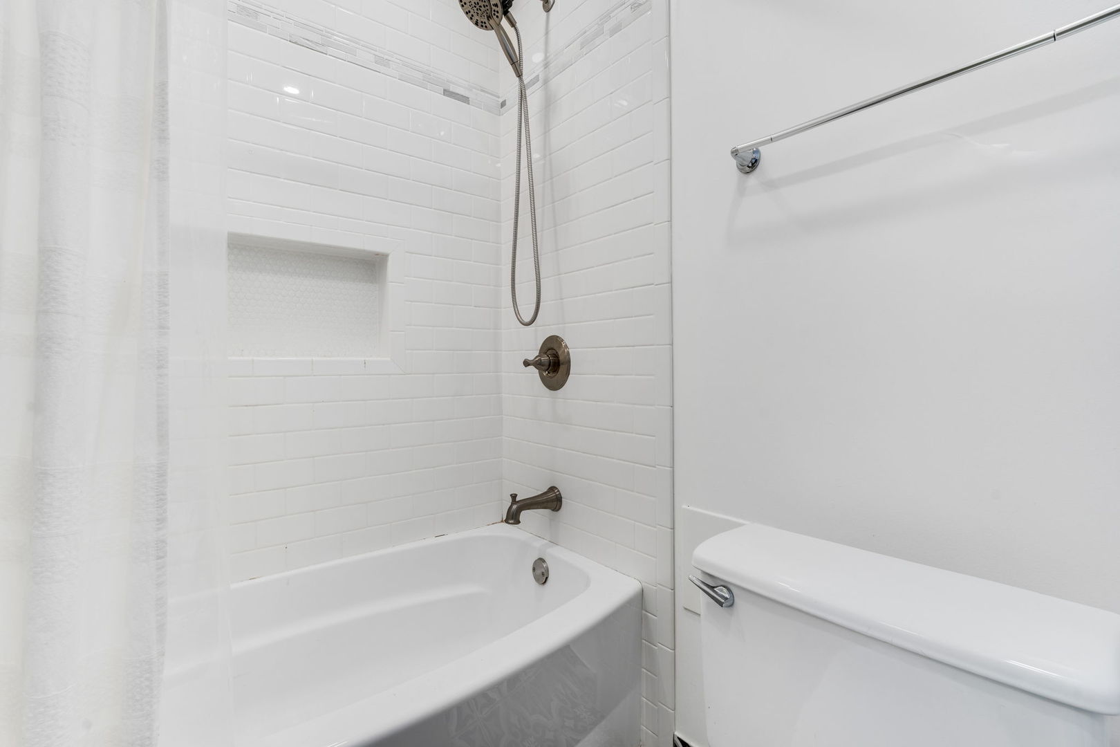 9820 South Pulaski Road, Unit 315 Oak Lawn, IL 60453 - Photo 16 of 20 a bathroom with a bathtub and a shower