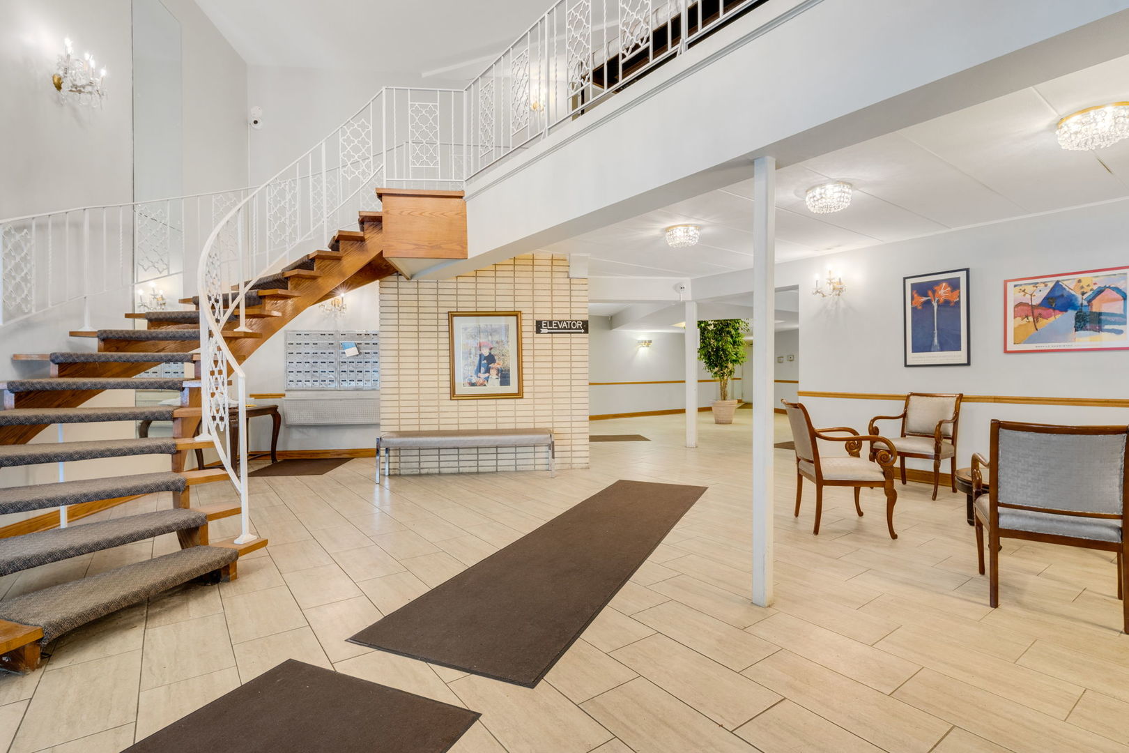 9820 South Pulaski Road, Unit 315 Oak Lawn, IL 60453 - Photo 2 of 20 a living room with furniture and stairs