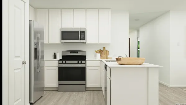a kitchen with a stove and a microwave