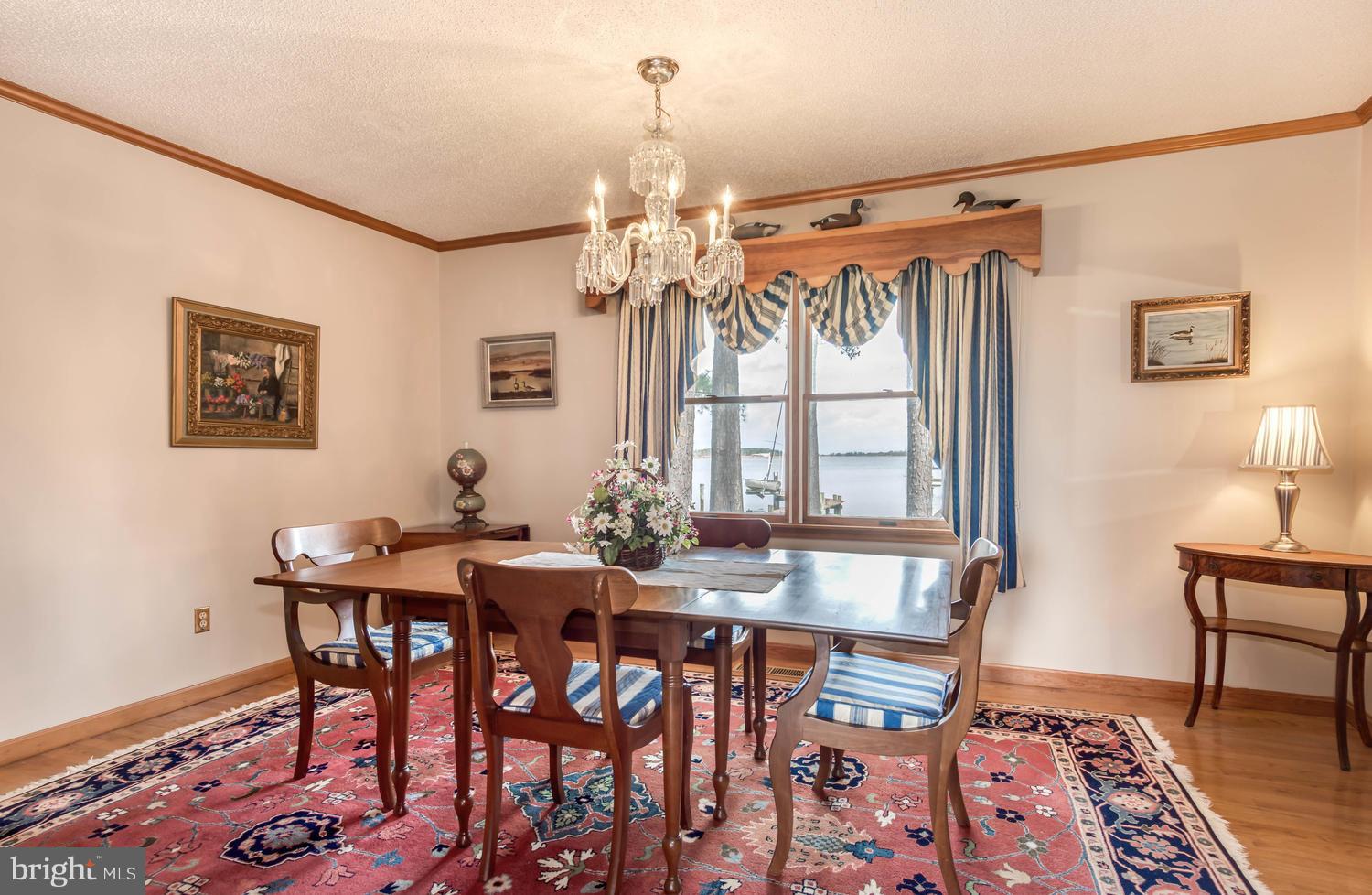 806 Seabreeze Road Cambridge, MD 21613 - Photo 15 of 41 Dining Room with wood flooring.
